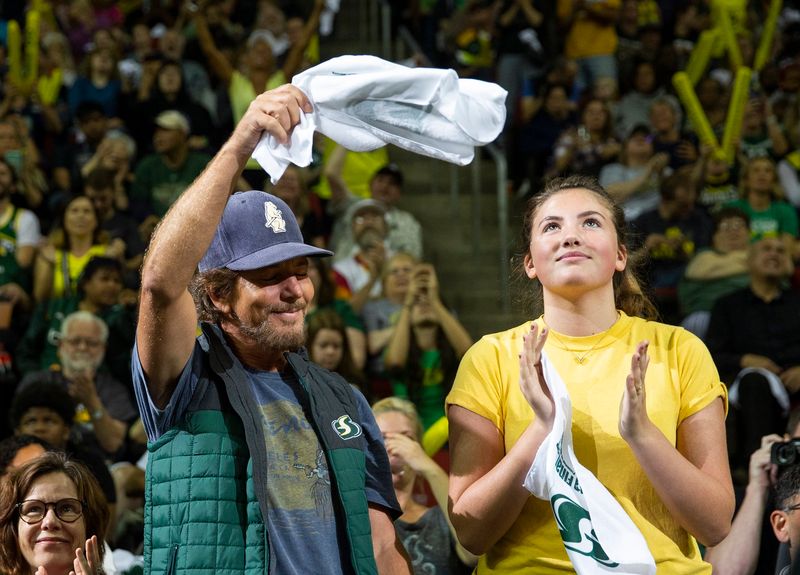 She supports his passions without needing the spotlight